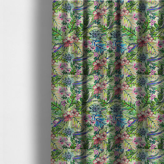 The fabric used to create these made-to-measure curtains is a vibrant, dense tropical pattern featuring colourful hibiscus and orchid flowers, spiky blue and white blooms, and lush green and blue palm leaves.