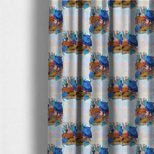 The fabric used to create these made-to-measure curtains is a colourful and vibrant jungle pattern on a pale background featuring a blue panther, tigers, leopards, monkeys, toucans, and lush tropical flora.