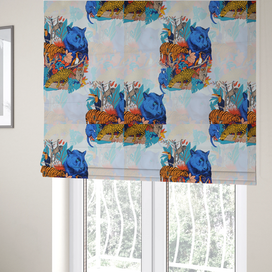 The fabric used to create these Roman blinds is a colourful and vibrant jungle pattern on a pale background featuring a blue panther, tigers, leopards, monkeys, toucans, and lush tropical flora.