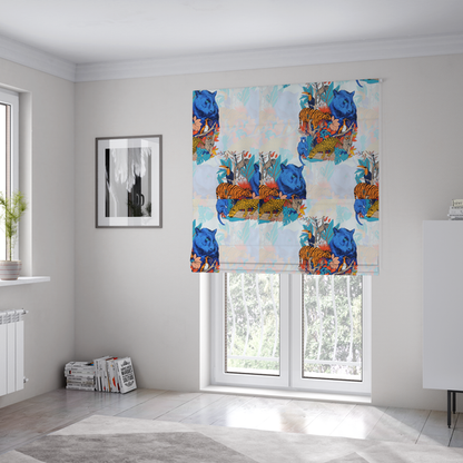 The fabric used to create these Roman blinds is a colourful and vibrant jungle pattern on a pale background featuring a blue panther, tigers, leopards, monkeys, toucans, and lush tropical flora.