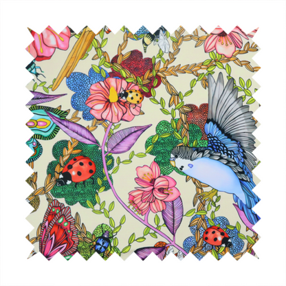A colourful and detailed repeating pattern on a light background featuring blue and yellow birds, bright butterflies, ladybugs, and vibrant pink flowers.