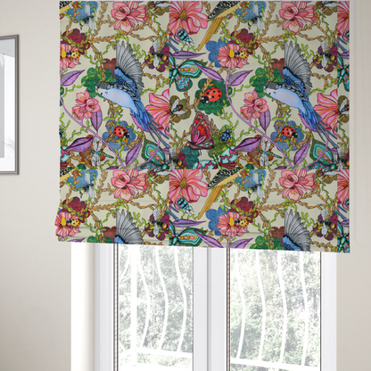 The fabric used to create these Roman blinds is a colourful and detailed repeating pattern on a light background featuring blue and yellow birds, bright butterflies, ladybugs, and vibrant pink flowers.