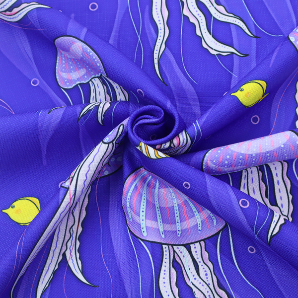 A vibrant underwater pattern on a rich blue background featuring glowing purple and pink jellyfish, tiny colourful fish, and floating bubbles.
