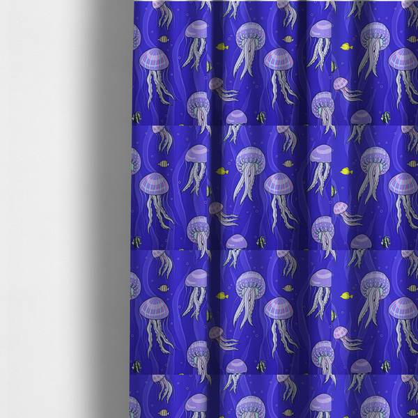 The fabric used to create these made-to-measure curtains is a vibrant underwater pattern on a rich blue background featuring glowing purple and pink jellyfish, tiny colourful fish, and floating bubbles.