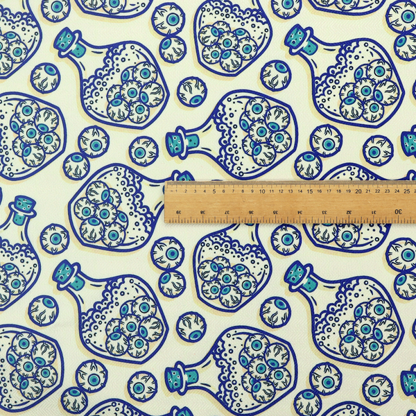 A repeating blue-and-white line-art pattern on a light beige background featuring glass potion bottles filled with piles of detailed eyeballs, surrounded by scattered loose eyeballs.
