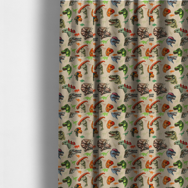 The fabric used to create these made-to-measure curtains has several distinct dinosaur heads are scattered across the pattern, including detailed illustrations of a Triceratops with horns, a green Tyrannosaurus rex with textured skin, a long-snouted Parasaurolophus with a prominent crest, a blue-headed theropod with a pink crest, an orange-headed ceratopsian, and a Spinosaurus with a crocodile-like snout.
