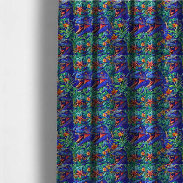 The fabric used to create these made-to-measure curtains is a vibrant, repeating pattern on a rich blue background featuring blue-and-purple Tyrannosaurus rex heads with open jaws and sharp teeth, surrounded by lush green tropical foliage, orange flowers, and plants.