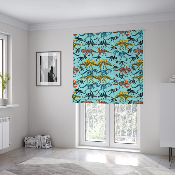 The fabric used to create these Roman blinds is a repeating pattern on a light blue background featuring colourful dinosaur skeletons in yellow, orange, blue, and black, depicting various species including Stegosaurus, Triceratops, and Tyrannosaurus rex.