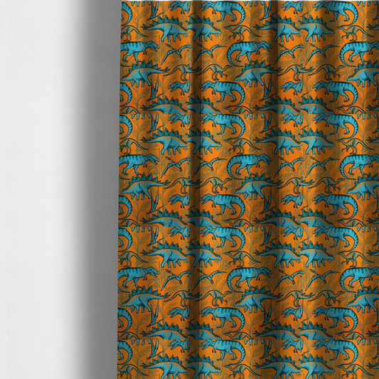 The fabric used to create these made-to-measure curtains is a repeating pattern on a bright orange background featuring blue dinosaurs, including Stegosaurus, T-Rex, and pterosaurs, set against a backdrop of palm leaves and tropical foliage.