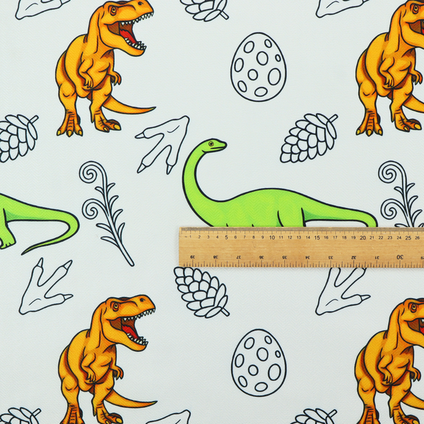 A repeating pattern on a light grey-blue background featuring orange Tyrannosaurus rex dinosaurs, a bright green long-necked sauropod, speckled dinosaur eggs, pinecones, footprints, and leafy sprigs.
