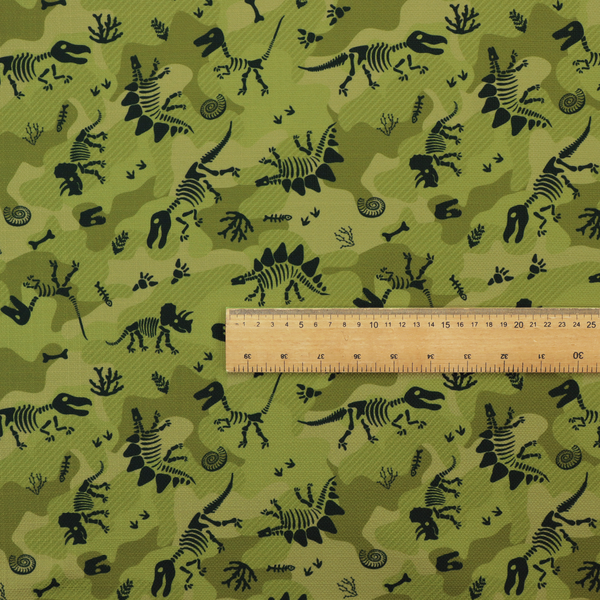 A military-style green camouflage pattern featuring repeating black dinosaur skeletons, bones, footprints, and fossils.