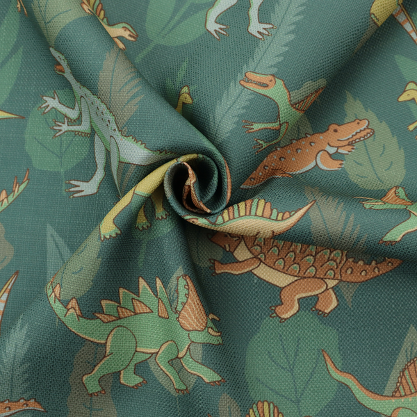 A playful dinosaur pattern on a deep teal background featuring various illustrated dinosaurs and lush tropical leaves.