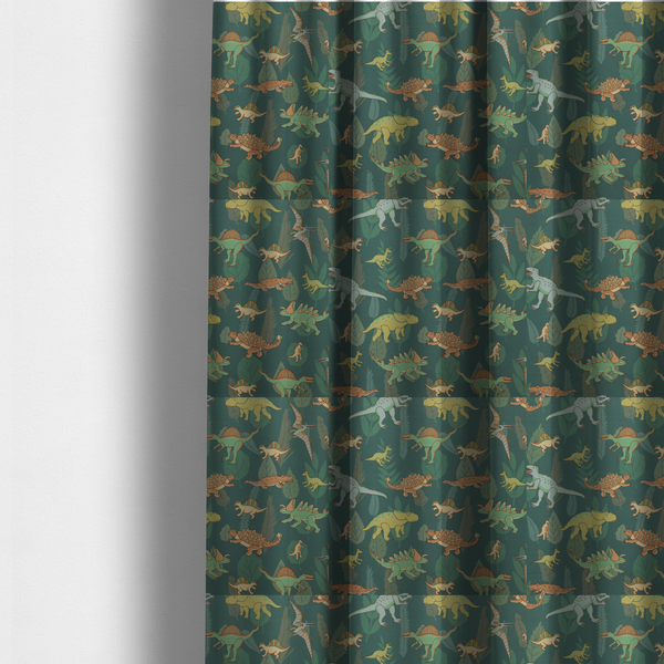 The fabric used to create these made-to-measure curtains is a playful dinosaur pattern on a deep teal background featuring various illustrated dinosaurs and lush tropical leaves.