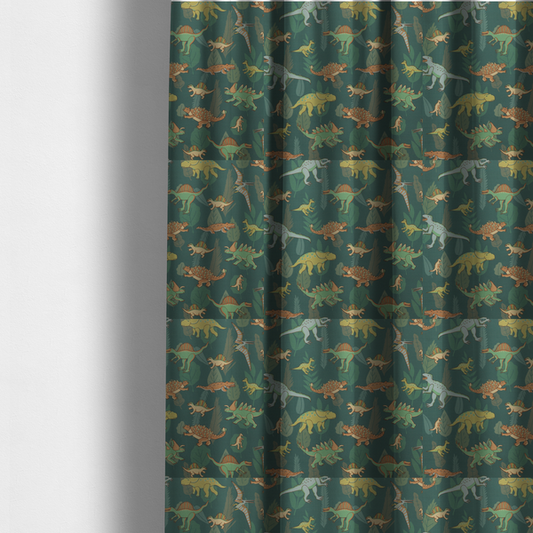 The fabric used to create these made-to-measure curtains is a playful dinosaur pattern on a deep teal background featuring various illustrated dinosaurs and lush tropical leaves.