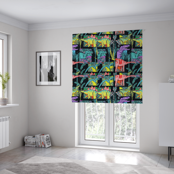 The fabric used to create these Roman blinds is a bold repeating pattern on a black background featuring colourful dinosaurs, including pink, yellow, teal, and purple species, framed within geometric panels and surrounded by tropical foliage.