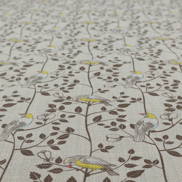 Vintage-style botanical fabric featuring yellow-bellied songbirds perched on climbing brown vines and rosebuds against a textured grey background.