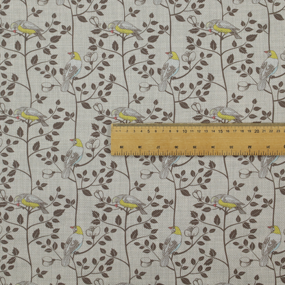 Vintage-style botanical fabric featuring yellow-bellied songbirds perched on climbing brown vines and rosebuds against a textured grey background.