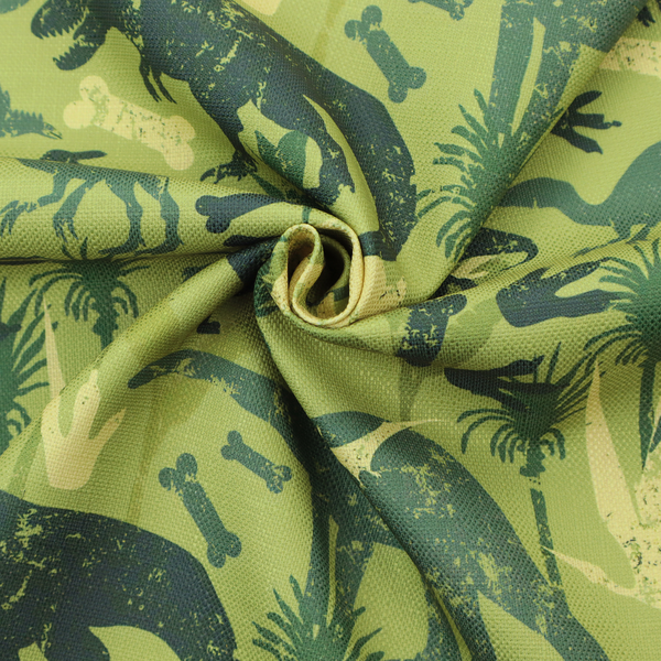 A textured, distressed green and olive camouflage pattern featuring repeating silhouettes of dinosaurs, bones, footprints, and palm fronds.