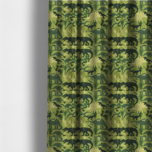The fabric used to create these made-to-measure curtains is a textured, distressed green and olive camouflage pattern featuring repeating silhouettes of dinosaurs, bones, footprints, and palm fronds.