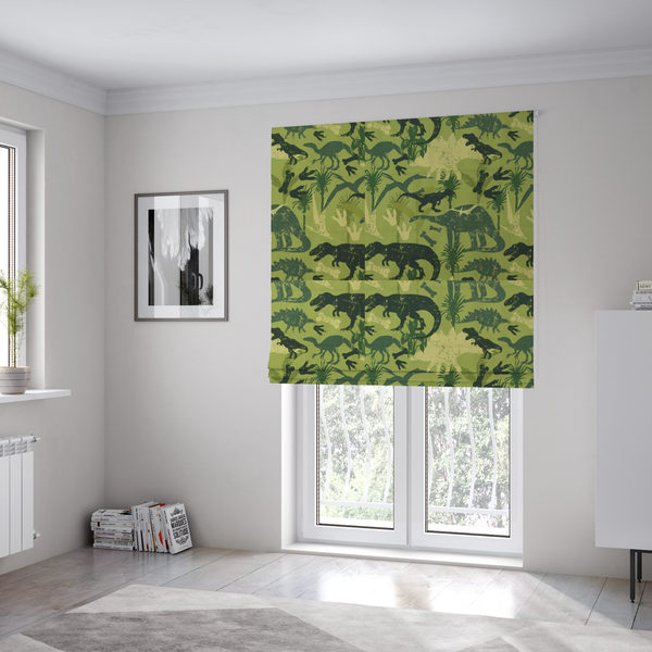 The fabric used to create these Roman blinds is a textured, distressed green and olive camouflage pattern featuring repeating silhouettes of dinosaurs, bones, footprints, and palm fronds.