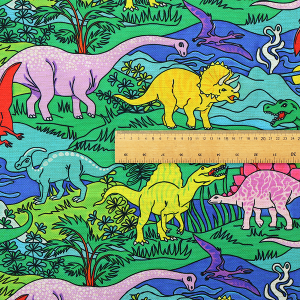 A vibrant, colourful repeating pattern featuring various cartoon dinosaurs including a pink long-neck, yellow triceratops, green T-Rex, and flying pterodactyls amidst a prehistoric landscape.
