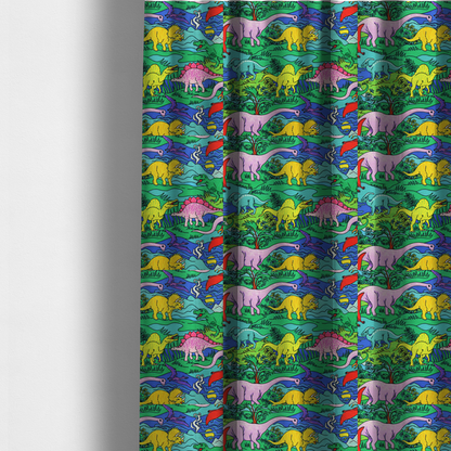 The fabric used to create these made-to-measure curtains is a vibrant, colourful repeating pattern featuring various cartoon dinosaurs including a pink long-neck, yellow triceratops, green T-Rex, and flying pterodactyls amidst a prehistoric landscape.