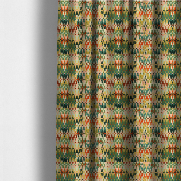 The fabric used to create these made-to-measure curtains is a seamless geometric upholstery fabric pattern featuring an intricate, symmetrical Aztec-inspired motif of interlocking diamonds and vertical zigzags in earthy tones of green, rust, mustard yellow, and peach.