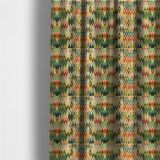 The fabric used to create these made-to-measure curtains is a seamless geometric upholstery fabric pattern featuring an intricate, symmetrical Aztec-inspired motif of interlocking diamonds and vertical zigzags in earthy tones of green, rust, mustard yellow, and peach.