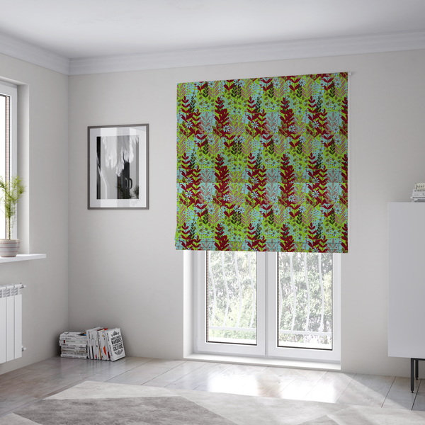 The fabric used to create these Roman blinds is a dense, seamless repeating botanical pattern featuring an array of stylized leaves, foliage, and small blue flowers set against a bright lime green background. The various plant elements are rendered in shades of deep red, mauve, dark brown, and pale blue.