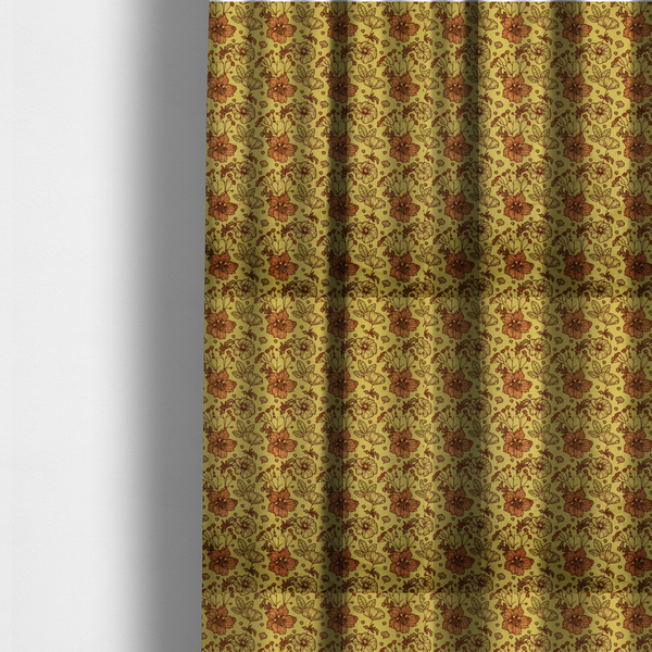 The fabric used to create these made-to-measure curtains is a seamless repeating botanical pattern featuring line-drawn flowers and foliage in shades of brown and burnt orange, set against a mustard yellow or gold background. The design includes clustered blossoms, delicate branching stems, and leafy elements arranged in a consistent layout.