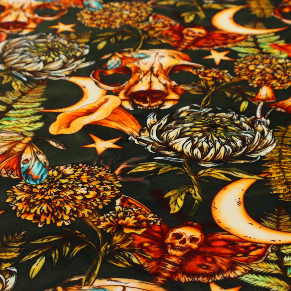 A dark and mystical repeating pattern featuring animal skulls, crescent moons, stars, moths, ferns, and chrysanthemums in warm golden and orange tones.