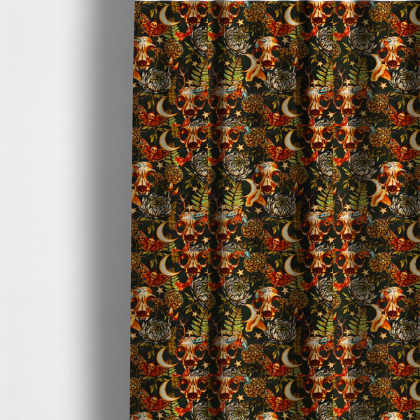 The fabric used to create these made-to-measure curtains is a dark and mystical repeating pattern featuring animal skulls, crescent moons, stars, moths, ferns, and chrysanthemums in warm golden and orange tones.