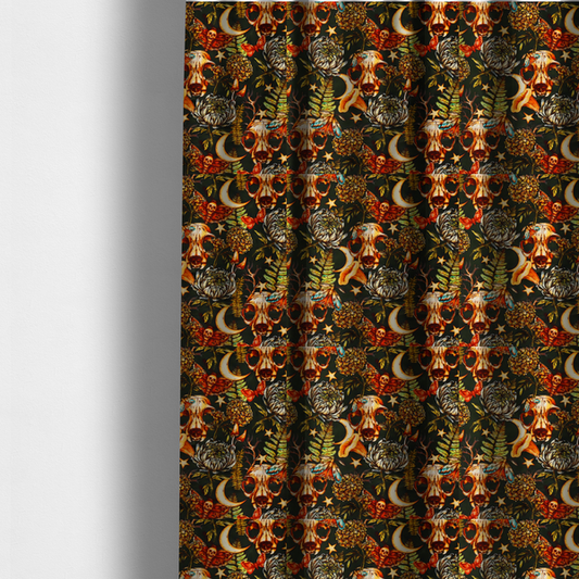 The fabric used to create these made-to-measure curtains is a dark and mystical repeating pattern featuring animal skulls, crescent moons, stars, moths, ferns, and chrysanthemums in warm golden and orange tones.