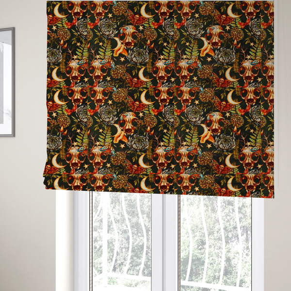 The fabric used to create these Roman blinds is a dark and mystical repeating pattern featuring animal skulls, crescent moons, stars, moths, ferns, and chrysanthemums in warm golden and orange tones.