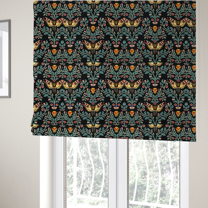 The fabric used to create these Roman blinds is a symmetrical, damask-style repeating pattern on a black background featuring death's-head hawkmoths, human skulls, and ornate scrolling blue-green vines with pink and red flowers.