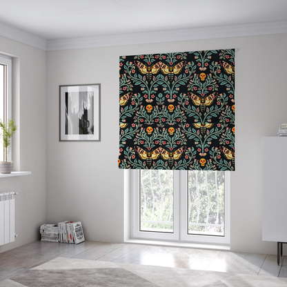 The fabric used to create these Roman blinds is a symmetrical, damask-style repeating pattern on a black background featuring death's-head hawkmoths, human skulls, and ornate scrolling blue-green vines with pink and red flowers.