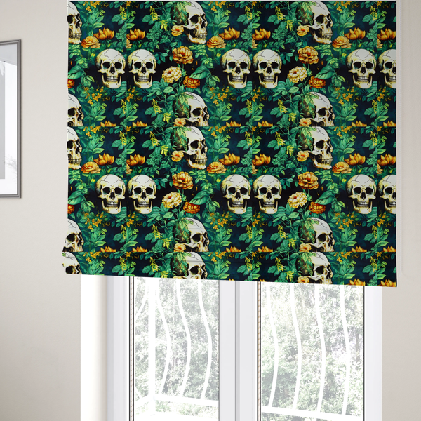The fabric used to create these Roman blinds is a detailed repeating pattern on a dark background featuring ivory human skulls entwined with vibrant green leafy vines and blooming yellow and orange flowers.