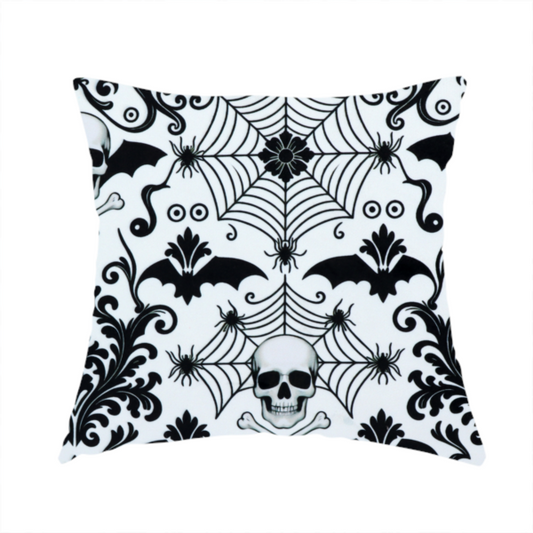 The fabric used to create this handmade cushion is a spooky, ornate damask-style repeating pattern on a white background featuring black skulls, bats, spiderwebs with small spiders, and crossbones.