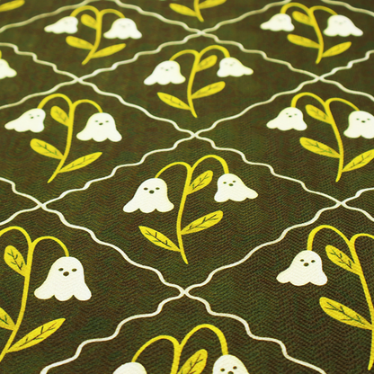 A dark olive-green vintage-style pattern featuring an ogee trellis grid framing whimsical, ghost-like floral blossoms with tiny faces.
