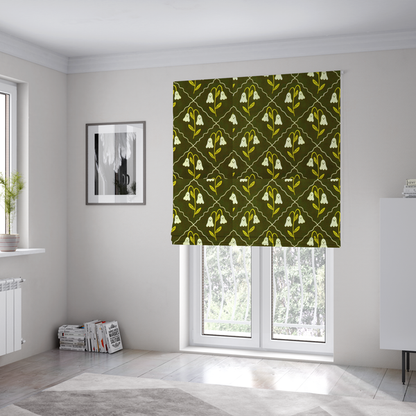 The fabric used to create these Roman blinds is a dark olive-green vintage-style pattern featuring an ogee trellis grid framing whimsical, ghost-like floral blossoms with tiny faces.