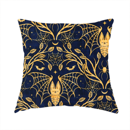 The fabric used to create this handmade cushion is a dark navy blue gothic damask pattern featuring golden yellow bats with webbed wings, intricate spiderwebs, spiders, and twisting branches with leaves.