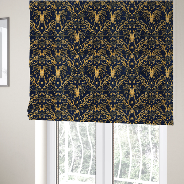The fabric used to create these Roman blinds is a dark navy blue gothic damask pattern featuring golden yellow bats with webbed wings, intricate spiderwebs, spiders, and twisting branches with leaves.