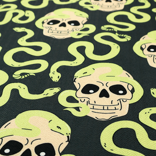 A dark charcoal pattern featuring glowing light green snakes slithering around and coiling through off-white human skulls.