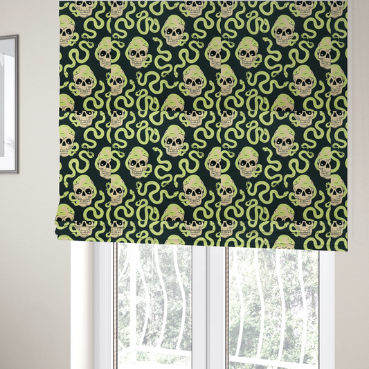 The fabric used to create these Roman blinds is a dark charcoal pattern featuring glowing light green snakes slithering around and coiling through off-white human skulls.