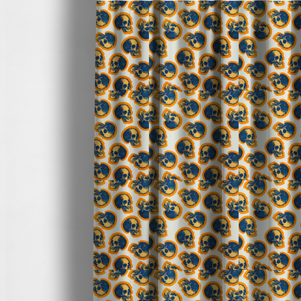 The fabric used to create these made-to-measure curtains is a repeating pattern on an off-white background featuring distressed blue and yellow human skulls outlined in bright orange.