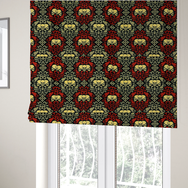 The fabric used to create these Roman blinds is a black gothic damask pattern featuring ornate red and cream scrolling foliage, fleur-de-lis accents, and groups of three yellow human skulls.