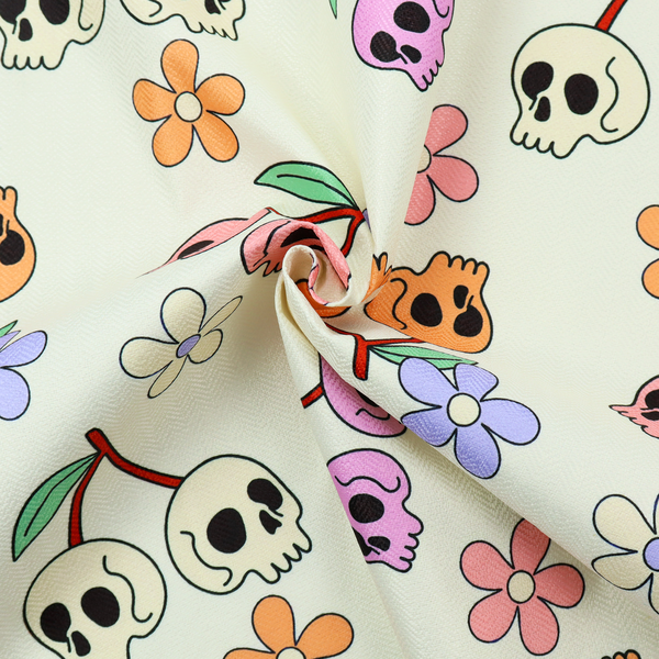 A light retro-style pattern featuring whimsical cherry pairs where the fruit is shaped like colourful skulls in shades of cream, pink, orange, and purple, accented by simple pastel flowers.