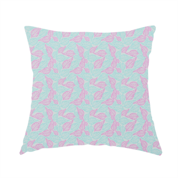 The fabric used to create this handmade cushion is a dense, seamless repeating botanical pattern featuring delicate outlines of leaves in contrasting shades of pink and light turquoise.