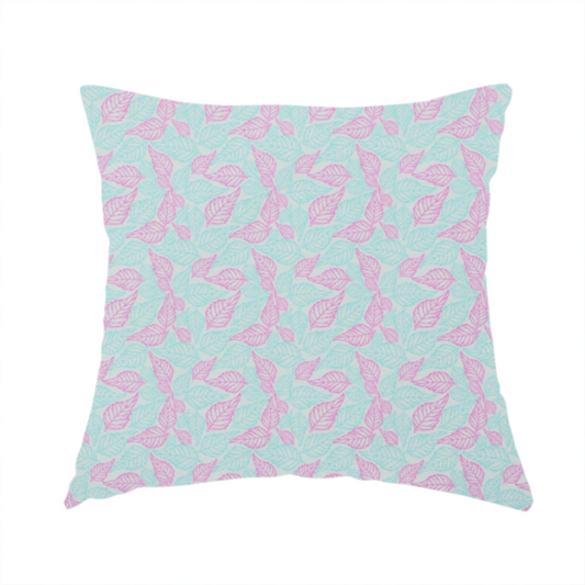 The fabric used to create this handmade cushion is a dense, seamless repeating botanical pattern featuring delicate outlines of leaves in contrasting shades of pink and light turquoise.