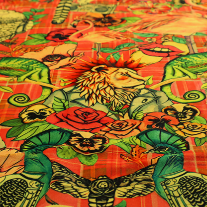 A busy, maximalist vintage-style fabric featuring a vibrant orange plaid background densely patterned with rock-and-roll animals in leather jackets and punk-inspired motifs, including cockatoos, flamingos, chameleons, a lion with a mohawk, meerkats, and lemurs intertwined with large flowers like poppies and pansies.